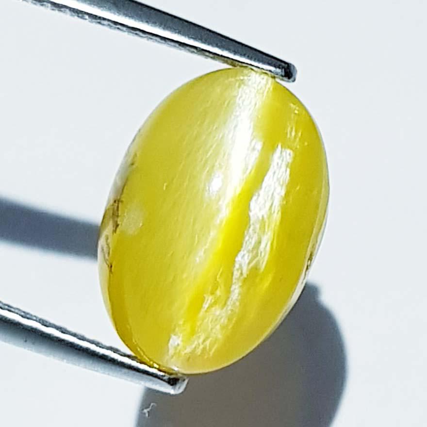 7.59 ct Natural Opal Cat's Eye: No Reserve! Title: 7.59 ct Natural Opal Cat's Eye Color/Clarity: Semi Transparent Carat Weight: 7.59 Size/Dimension: 13.50 x 9.30 x 10.10 Additional Information: Oval - Africa Shipping: Domestic: Fla