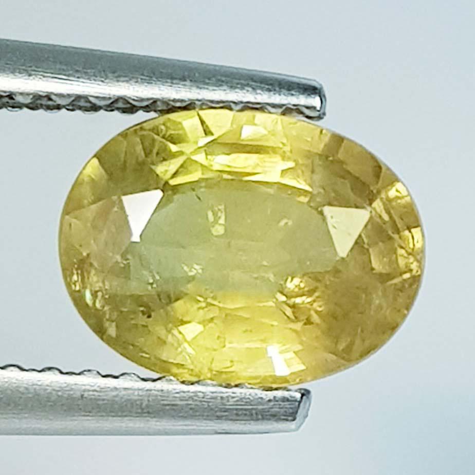 1.80 ct Natural Yellow Sapphire: No Reserve! Title: 1.80 ct Natural Yellow Sapphire Color/Clarity: VS Carat Weight: 1.8 Size/Dimension: 8.20 x 6.20 x 4.00 Additional Information: Oval - Burma Shipping: Domestic: Flat-rate of $7.00