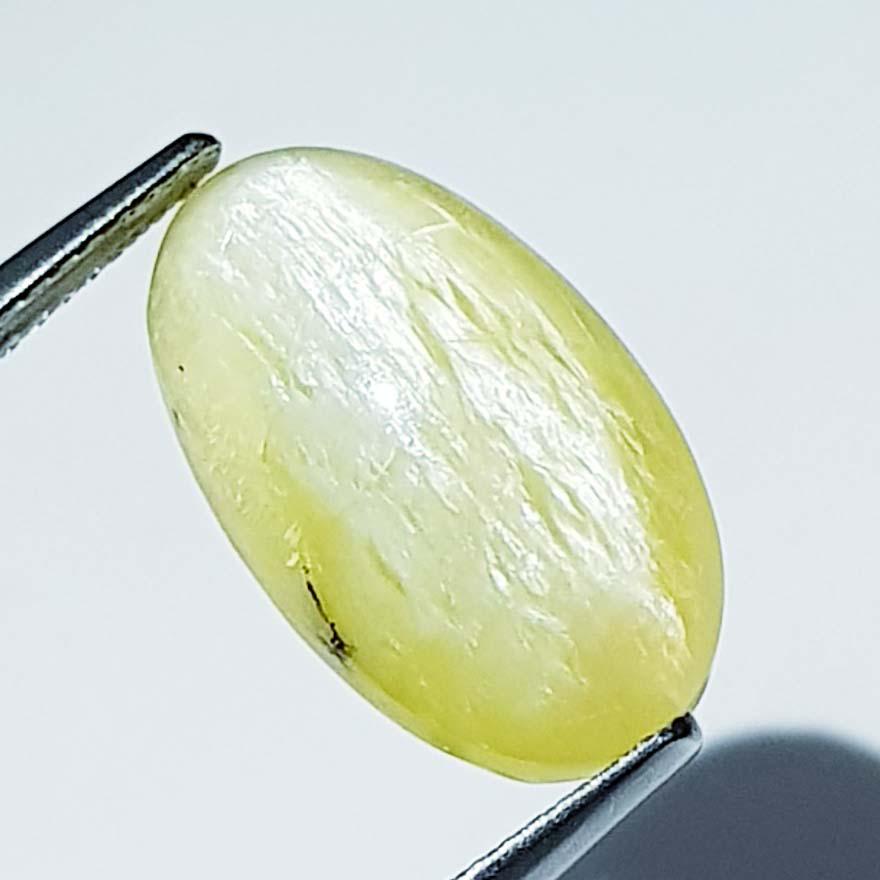 9.99 ct Natural Opal Cat's Eye: No Reserve! Title: 9.99 ct Natural Opal Cat's Eye Color/Clarity: Semi Transparent Carat Weight: 9.99 Size/Dimension: 16.80 x 10.00 x 9.70 Additional Information: Oval - Africa Shipping: Domestic: Fla