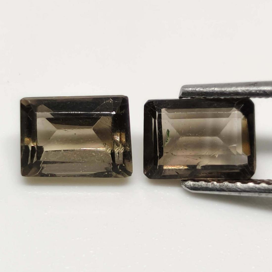 2.50 ct Natural Facetd Smoky Quartz Pair: No Reserve! Gemstones: Smoky Quartz Carat Weights: 2.50 ct Size/Dimensions: 7 X 5 Origin : Scotland Shipping: Domestic: Flat-rate of $7.00 to anywhere within the contiguous U.S. International: Foreign