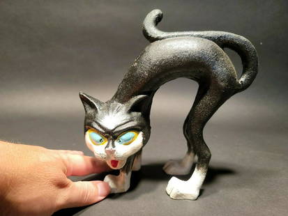 Cast Iron Scared Cat Door Stop: 7 3/4 Tall x 7 1/2" long Such a neat cast iron cat figure in a scared pose. Nice quality! Such a great item for any cat lover. All solid cast iron Reserve: $30.00 Shipping:Domestic: Flat-rate of