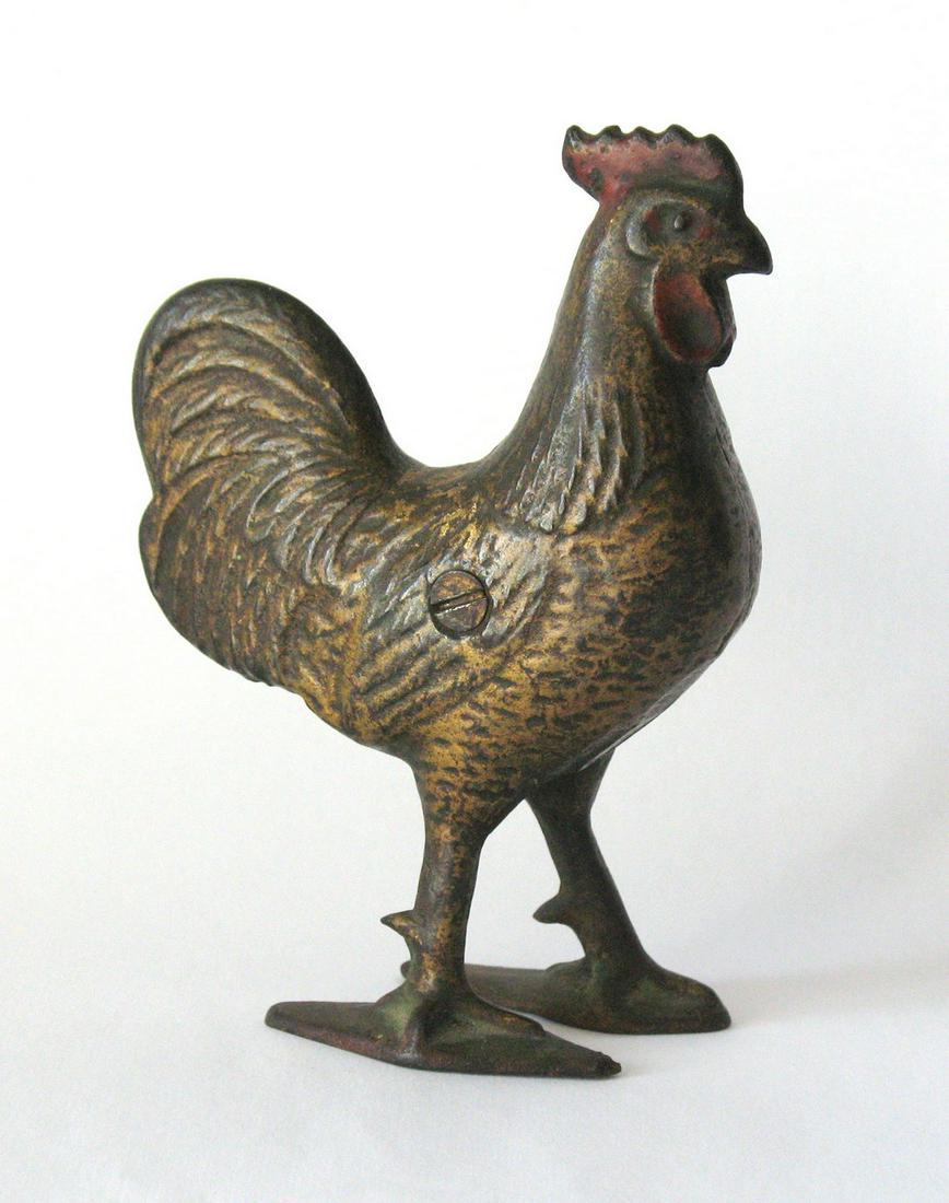 Vintage cast iron rooster penny bank. (1 of 2)
