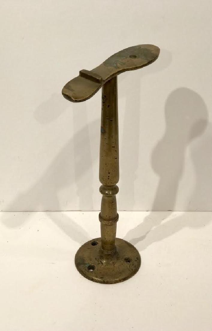 Shoe Shine Stand Brass Foot Rest: Shoe Shine stand brass foot rest Heavy brass, sculptural form, good patina. New England. 15 h x 7 w c 1920 Shipping: Domestic: Flat-rate of $50.00 to anywhere within the contiguous U.S. International: