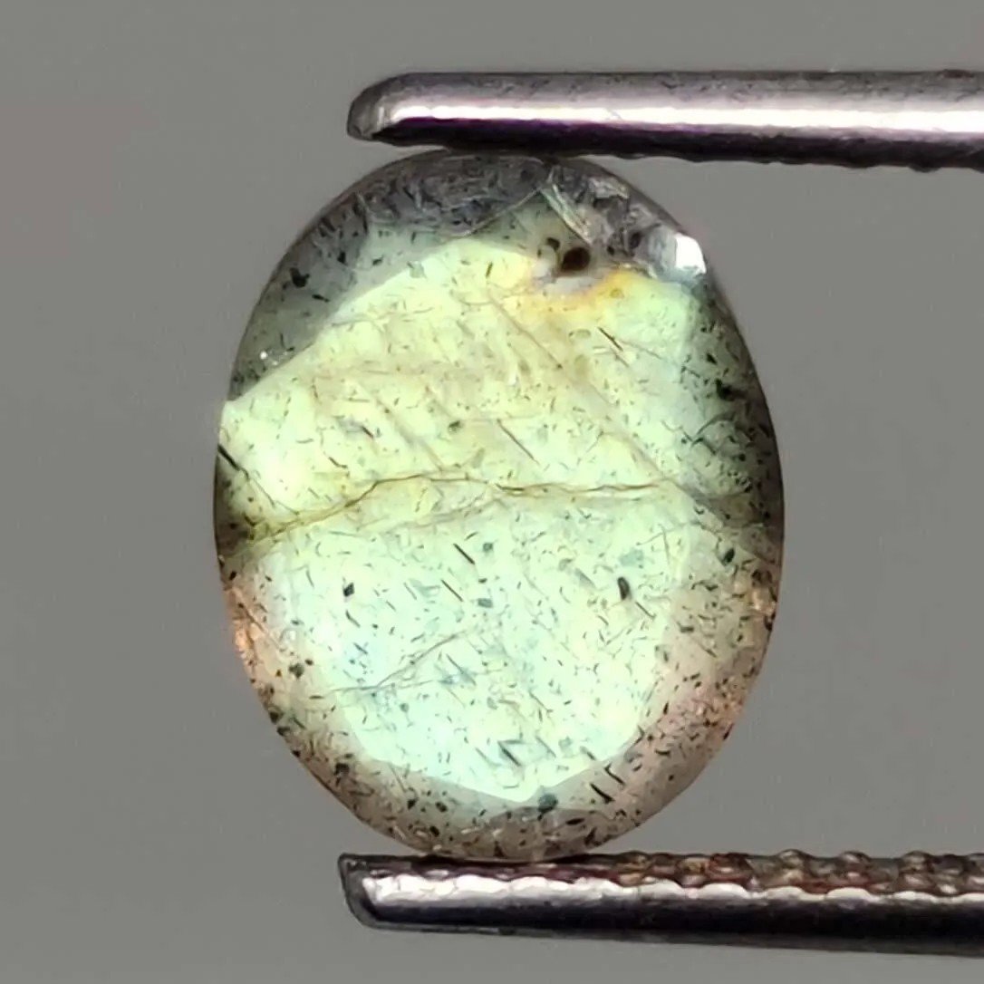 1.65 ct Natural Faceted Labradorite: No Reserve! Gemstones: Labradorite Carat Weights: 1.65 ct Size/Dimensions: 9 X 7 mm Origin : Labrador Shipping: Domestic: Flat-rate of $7.00 to anywhere within the contiguous U.S. International: Forei