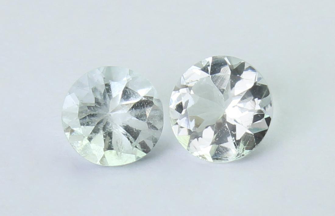 1.06 Cts Natural Aquamarine Lot: No Reserve! Gemstone : Natural Aquamarine Origin: Australia Weight : 1.06 carats Dimensions : 5.5x5.5 mm Shape : Round Cut Number Of Stone : 2 Color : Colorles Treatment : No Treatment Transparency : 