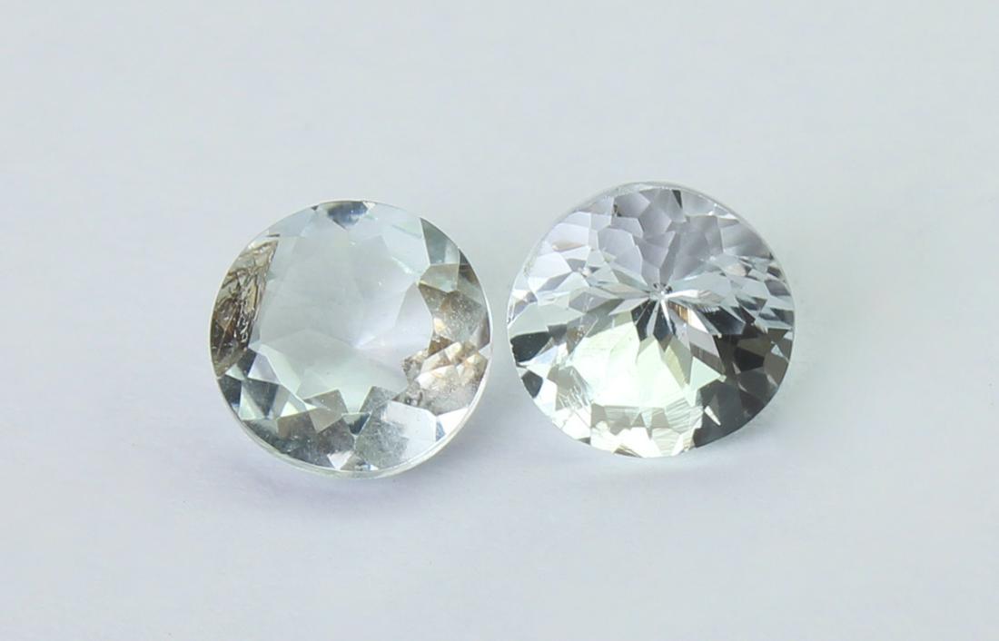 1.23 Cts Natural Aquamarine Lot: No Reserve! Gemstone : Natural Aquamarine Origin : Australia Weight : 1.23 carats Dimensions : 5.5x5.5 mm Shape : Round Cut Number Of Stone : 2 Color : Colorles Treatment : No Treatment Transparency :
