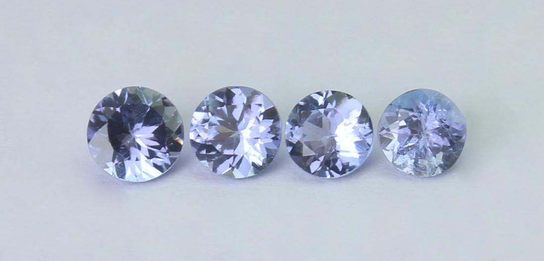 1.06 Cts Natural Tanzanite Lot: No Reserve! Gemstone : Natural Tanzanite Shape and cut : Round Cut Weight : 1.06 Carats Measurements : 3x3 mm Number Of Stone : 8 Color : voilite Transprancy : Transparent Treatment : No Treatment Ori