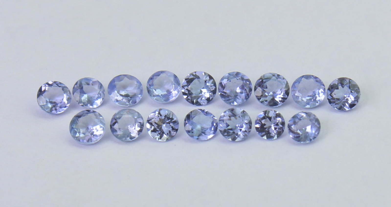 1.05 Cts Natural Tanzanite Lot: No Reserve! Gemstone : Natural Tanzanite Shape and cut : Round Cut Weight : 1.05 Carats Measurements : 2.66x2.64x1.53 - 2.22x2.20x1.43 mm Number Of Stone : 16 Color : voilite Transprancy : Transparent
