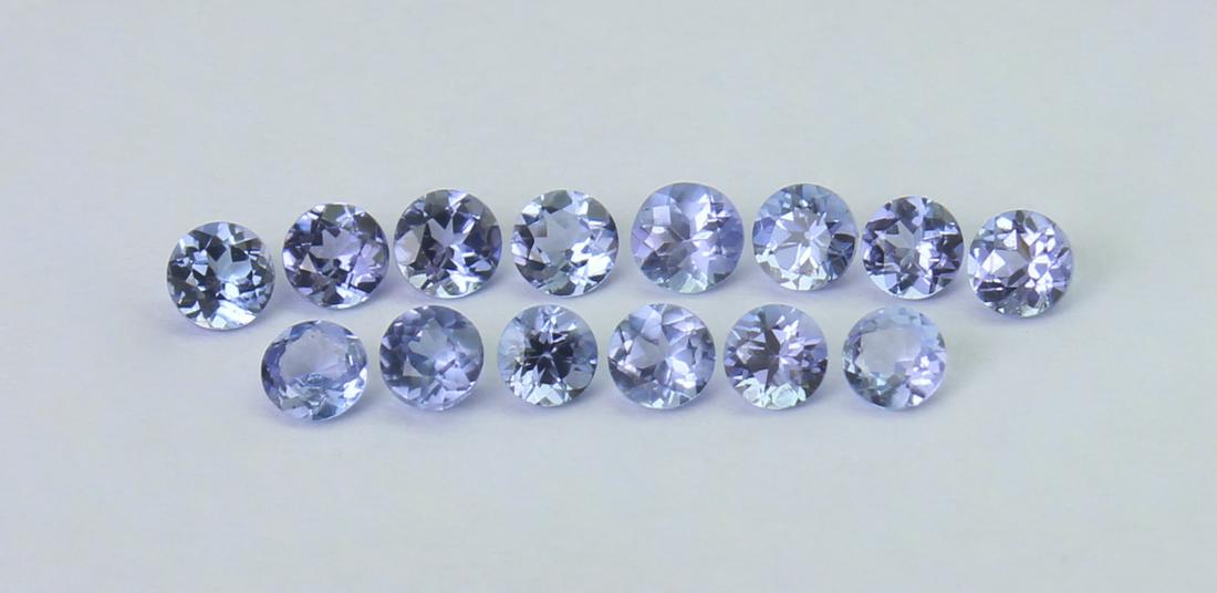 1.05 Cts Natural Tanzanite Lot: No Reserve! Gemstone : Natural Tanzanite Shape and cut : Round Cut Weight : 1.05 Carats Measurements : 2.5x2.5 mm Number Of Stone : 14 Color : voilite Transprancy : Transparent Treatment : No Treatmen