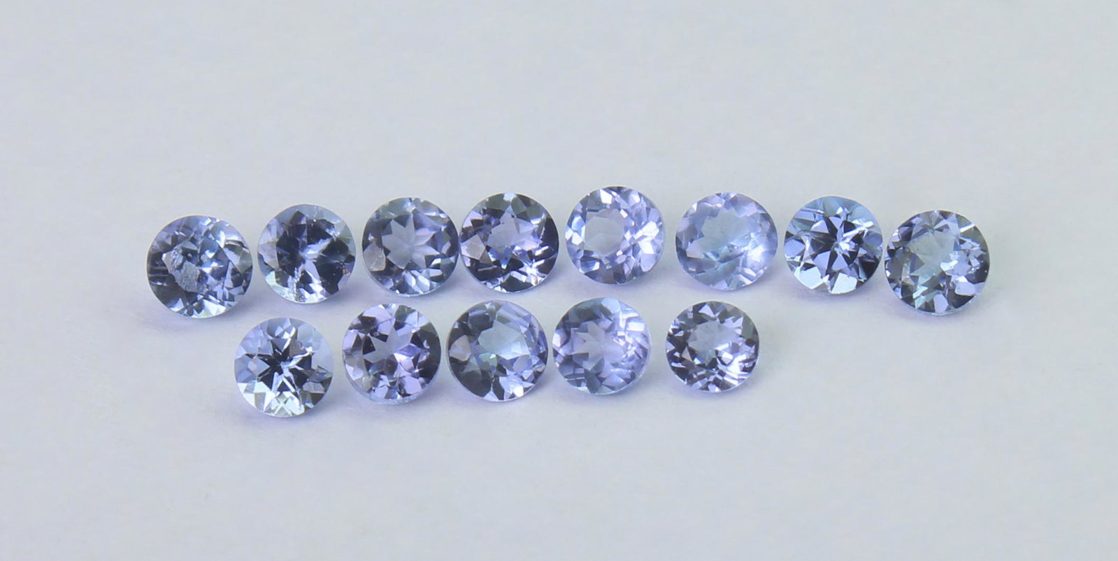 1.01 Cts Natural Tanzanite Lot: No Reserve! Gemstone : Natural Tanzanite Shape and cut : Round Cut Weight : 1.01 Carats Measurements : 2.5x2.5 mm Number Of Stone : 13 Color : voilite Transprancy : Transparent Treatment : No Treatmen