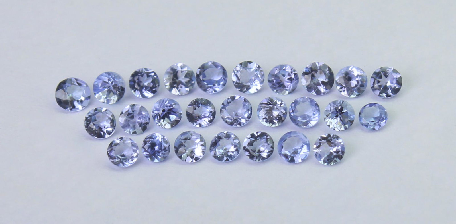1.05 Cts Natural Tanzanite Lot: No Reserve! Gemstone : Natural Tanzanite Shape and cut : Round Cut Weight : 1.05 Carats Measurements : 2x2 mm Number Of Stone : 26 Color : voilite Transprancy : Transparent Treatment : No Treatment Or