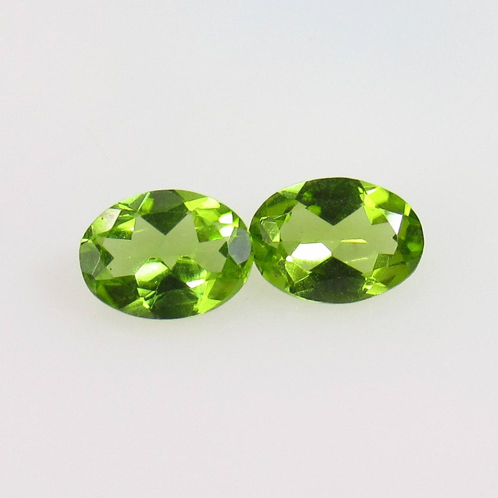 2.00 Ct Natural Pakistan Peridot Oval Pair: No Reserve! Title: 2.00 Ct Natural Pakistan Peridot Oval Pair Stone Clarity: VVS Gemstone: Natural Peridot Carat Weights: 2.00 Size/Dimensions: 8.00 x 5.80 x 3.00 mm / 2 Pc's Additional Info: Top Clas