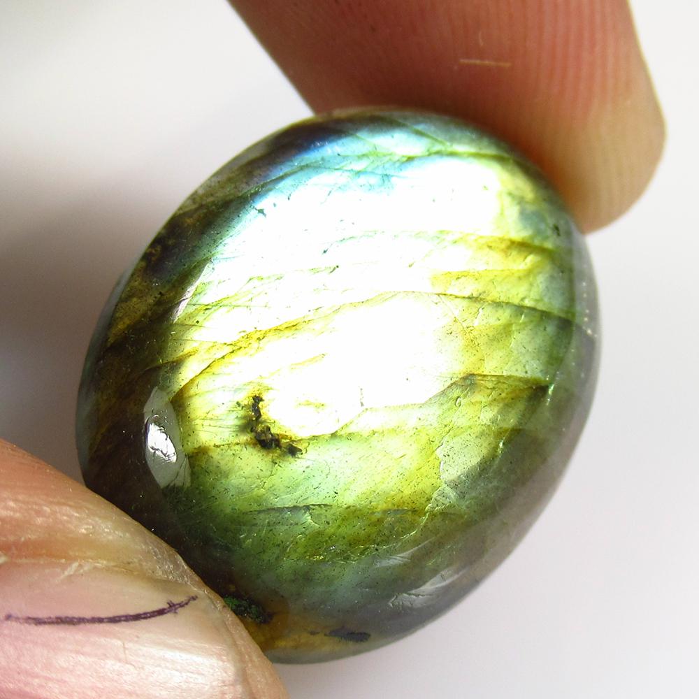 23.45 Ct Natural Labradorite Oval Cab: No Reserve! Title: 23.45 Ct Natural Labradorite Oval Cab Stone Clarity: Opaque Gemstone: Natural Labradorite Carat Weights: 23.45 Size/Dimensions: 25.00 x 19.00 x 6.70 mm Additional Info: Excellent Ov