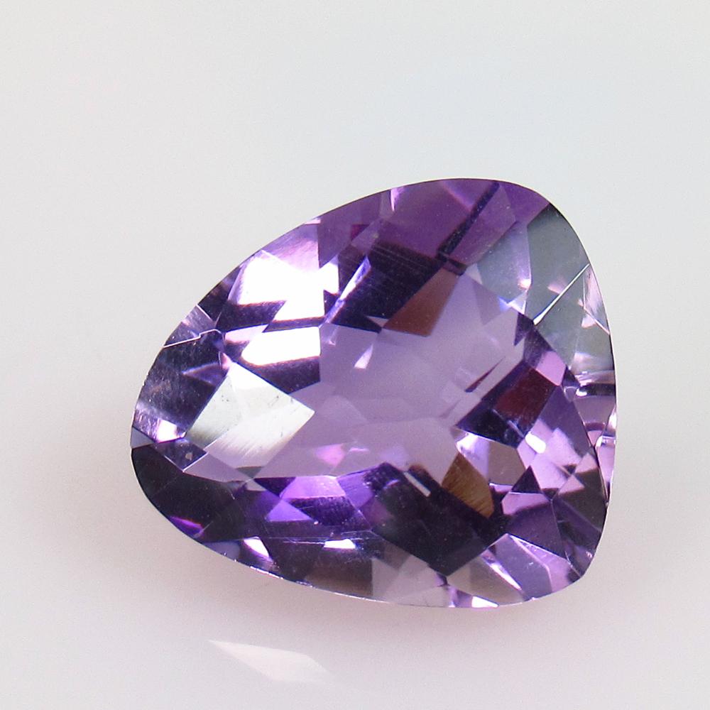 8.15 Ct Natural Purple Amethyst Triilion Cut: No Reserve! Title: 8.15 Ct Natural Purple Amethyst Triilion Cut Stone Clarity: VVS Gemstone: Natural Amethyst Carat Weights: 8.15 Size/Dimensions: 14.80 x 12.70 x 8.40 mm Additional Info: Excellent Tr