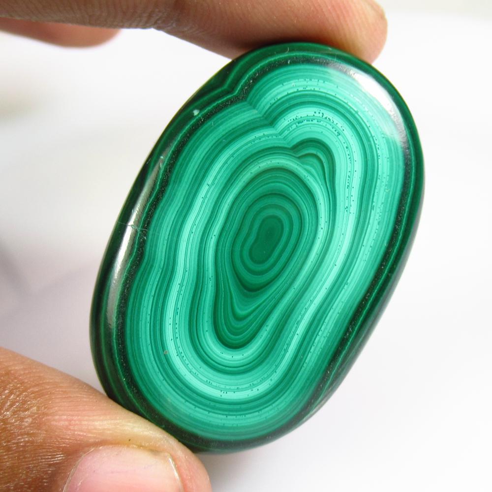103.95 Ctw Natural Green Malachite Oval Cab: No Reserve! Title: 103.95 Ctw Natural Green Malachite Oval Cab Stone Clarity: Opaque Gemstone: Natural Malachite Carat Weights: 103.95 Size/Dimensions: 45.00 x 30.00 x 6.30 mm Additional Info: Nice Ov