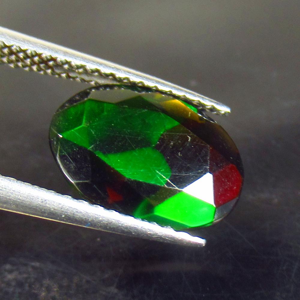 1.79 Ct Natural Ethiopian Black Fire Opal Oval Cut: No Reserve! Title: 1.79 Ct Natural Ethiopian Black Fire Opal Oval Cut Stone Clarity: Translucent Gemstone: Natural Black Opal Carat Weights: 1.79 Size/Dimensions: 11.20 x 8.40 x 4.50 mm Additional Inf