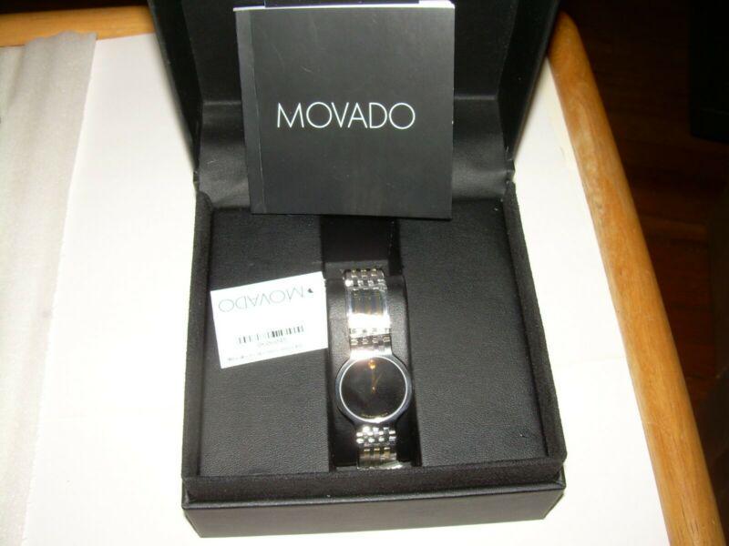 Movado Esperanza 0606045 Two-Tone Stainless Steel Watch: Movado Esperanza 0606045 two-tone stainless steel watch powered by precise Swiss quartz movement features a highly scratch resistant sapphire crystal. Comes in a stainless steel case; black dial and i