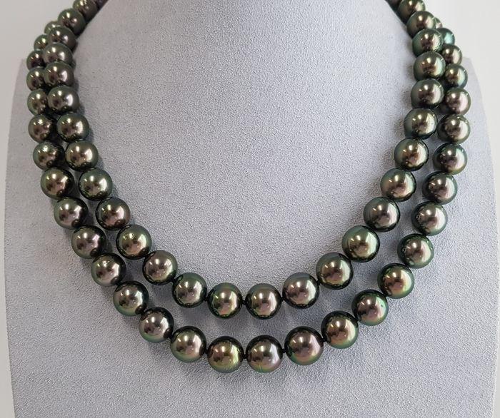 8x11mm Round Peacock Green Tahitian pearls - Necklace: Title: 8x11mm Round Peacock Green Tahitian pearls - Necklace Description: A beautiful double pearl necklace of peacock green near round Tahitian pearls with exceptional lustre, and completed with an e