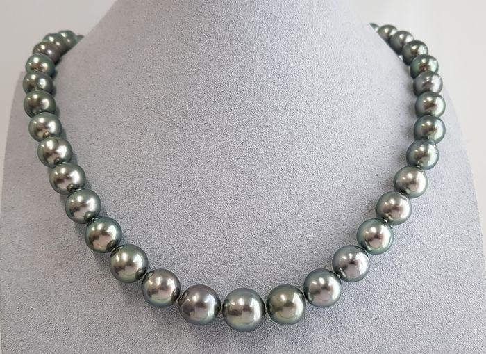 8x12mm Silvery Peacock Tahitian pearls - Necklace: Title: 8x12mm Silvery Peacock Tahitian pearls - Necklace Description: A nice Tahitian pearl necklace, made with off round pearls that will shimmer with beautiful silvery green overtones and finished w