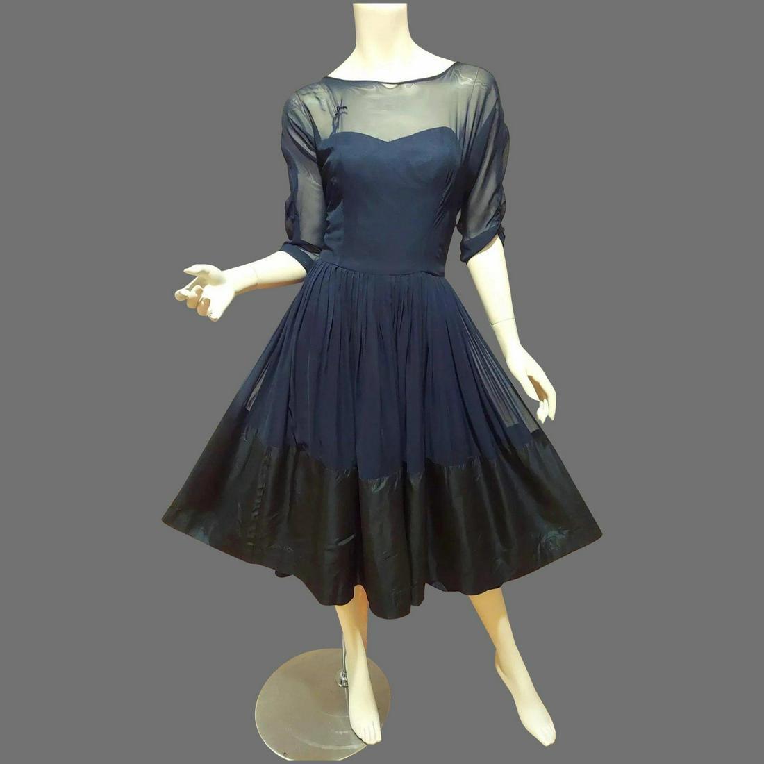 Vtg 1950 Ferman O'grady organza/Voile & Taffeta Party: Stunning 1950's Full sweep dress with illusion neckline by Ferman O'grady. Sweetheart illusion bustline Covered in Crepe/Voile and so is the full skirt the back has a kitten bow and Metal zipper.. In 
