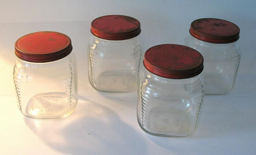 Group of four vintage country store seed jars. (1 of 2)