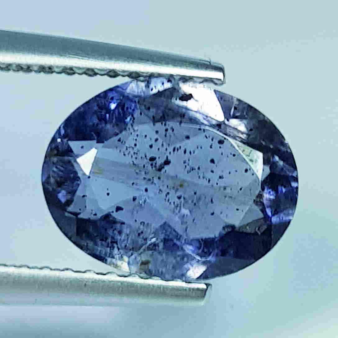 1.80 ct Natural Iolite Oval Cut: No Reserve! Title: 1.80 ct Natural Iolite Oval Cut Color/Clarity: SI Carat Weight: 1.8 Size/Dimensions: 10.20 x 8.00 x 3.90 Additional Information: Oval- Brazil Shipping: Domestic: Flat-rate of $7.00