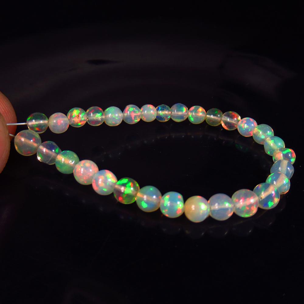 8.85 Ct Natural 30 Drilled Multi-Color Fire Opal Ball (1 of 2)