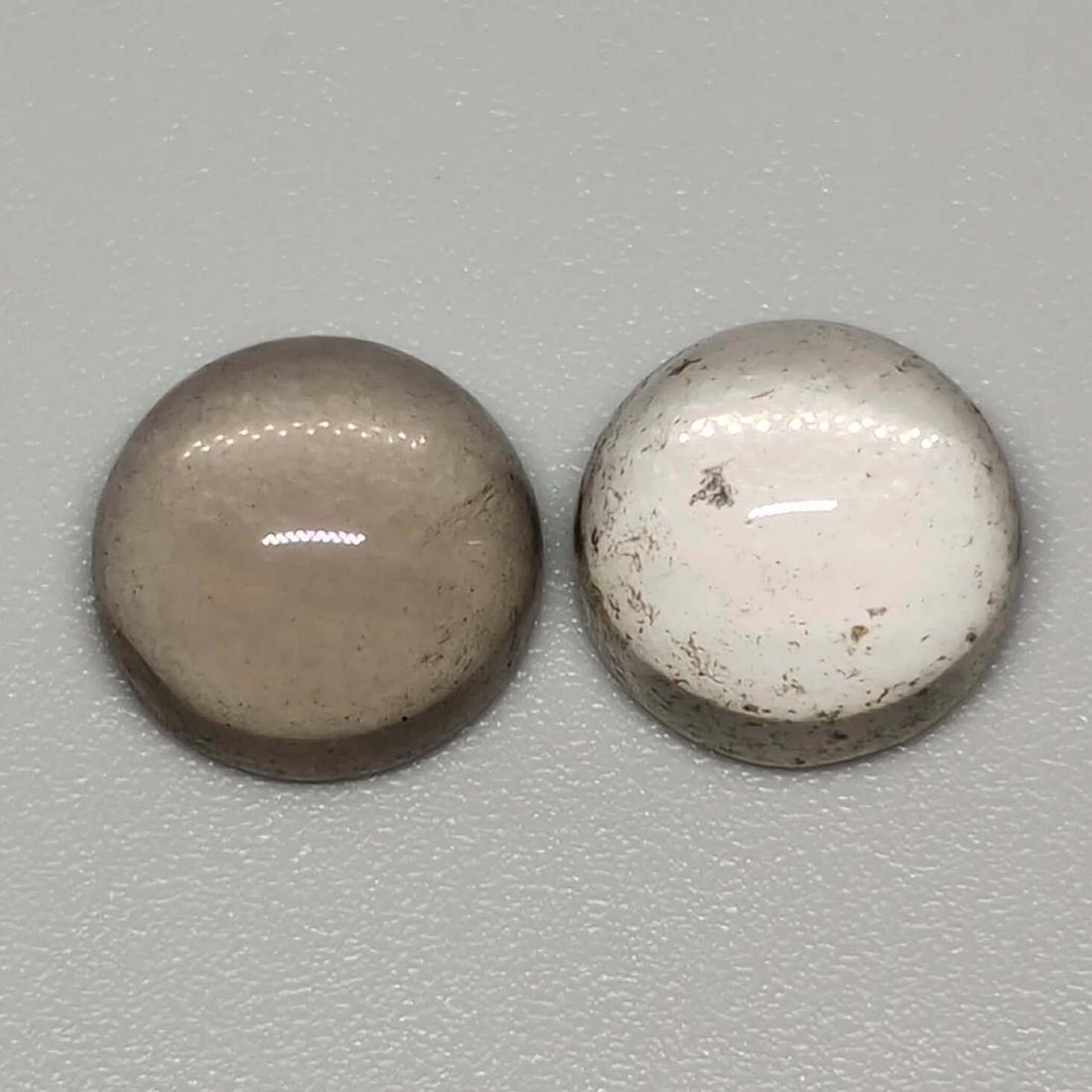 6.85 ct Natural Smoky Quartz Pair: No Reserve! Gemstones: Smoky Quartz Carat Weights: 6.85 ct Size/Dimensions: 9 x 9 x 5.6 mm Origin : Scotland Shipping: Domestic: Flat-rate of $7.00 to anywhere within the contiguous U.S. International