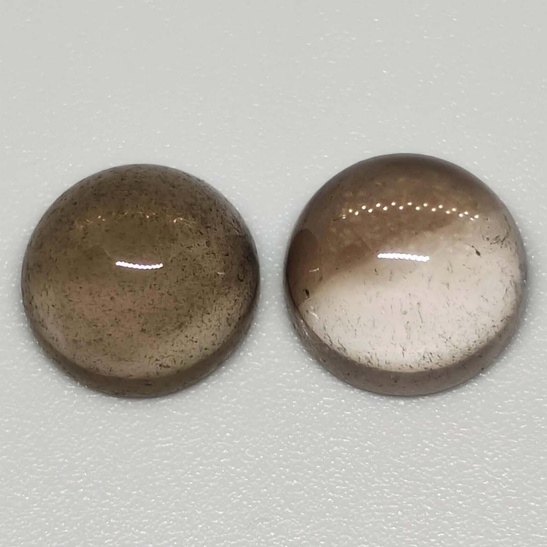 6.25 ct Natural Smoky Quartz Pair: No Reserve! Gemstones: Smoky Quartz Carat Weights: 6.25 ct Size/Dimensions: 9 x 9 x 5 mm Origin : Scotland Shipping: Domestic: Flat-rate of $7.00 to anywhere within the contiguous U.S. International: 