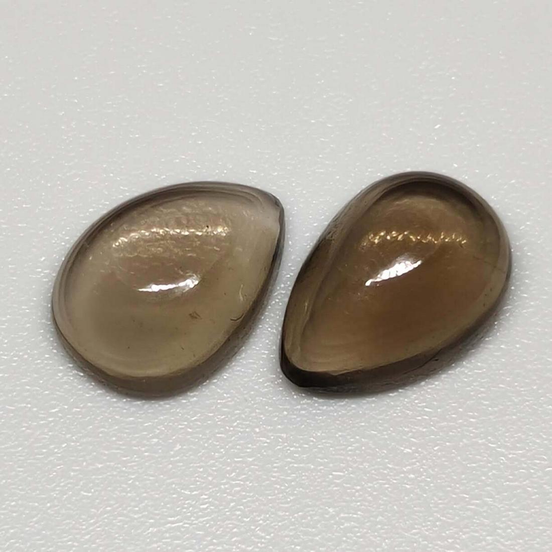 4.50 ct Natural Smoky Quartz Pair: No Reserve! Gemstones: Smoky Quartz Carat Weights: 4.50 ct Size/Dimensions: 10 x 7 x 4 mm Origin : Scotland Shipping: Domestic: Flat-rate of $7.00 to anywhere within the contiguous U.S. International: