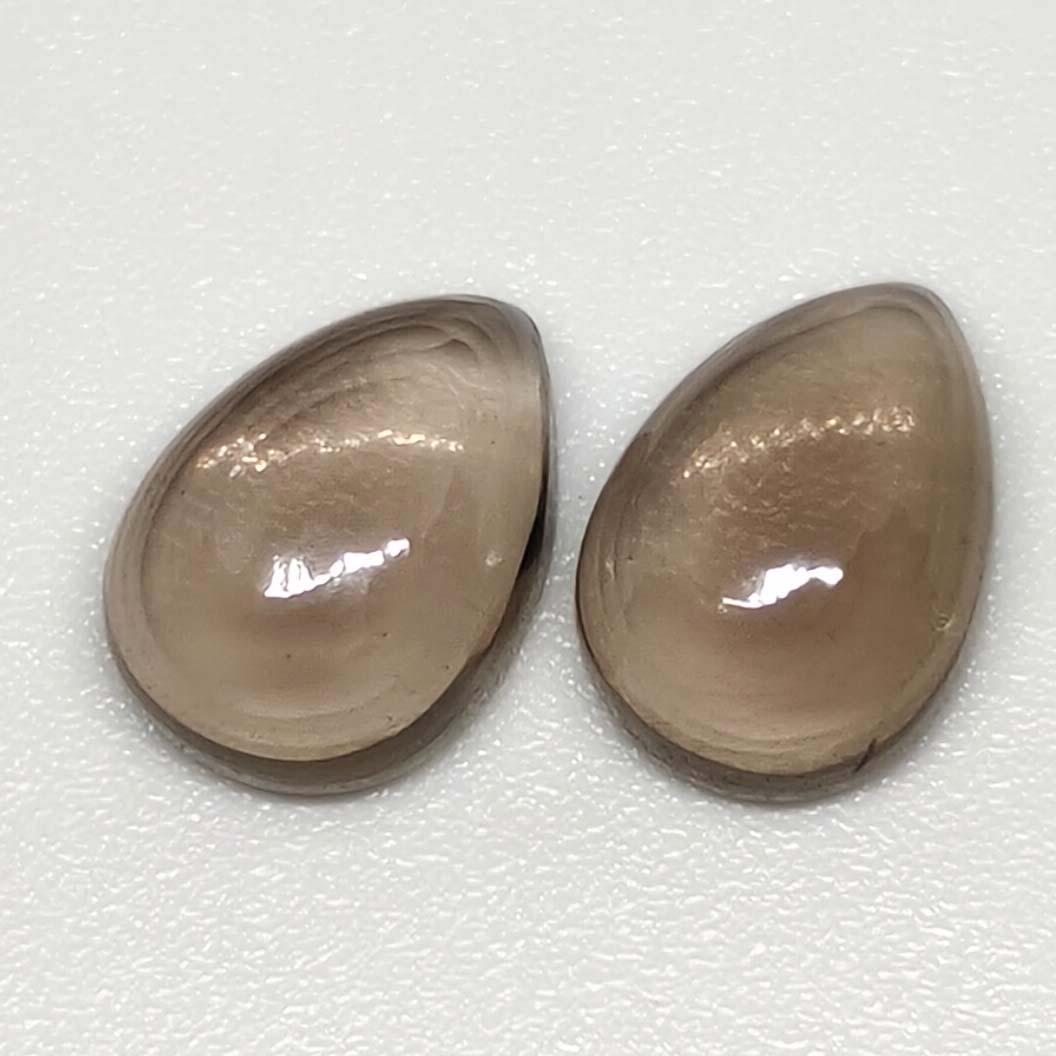 4.75 ct Natural Smoky Quartz Pair: No Reserve! Gemstones: Smoky Quartz Carat Weights: 4.75 ct Size/Dimensions: 10 x 7 x 4.7 mm Origin : Scotland Shipping: Domestic: Flat-rate of $7.00 to anywhere within the contiguous U.S. Internationa