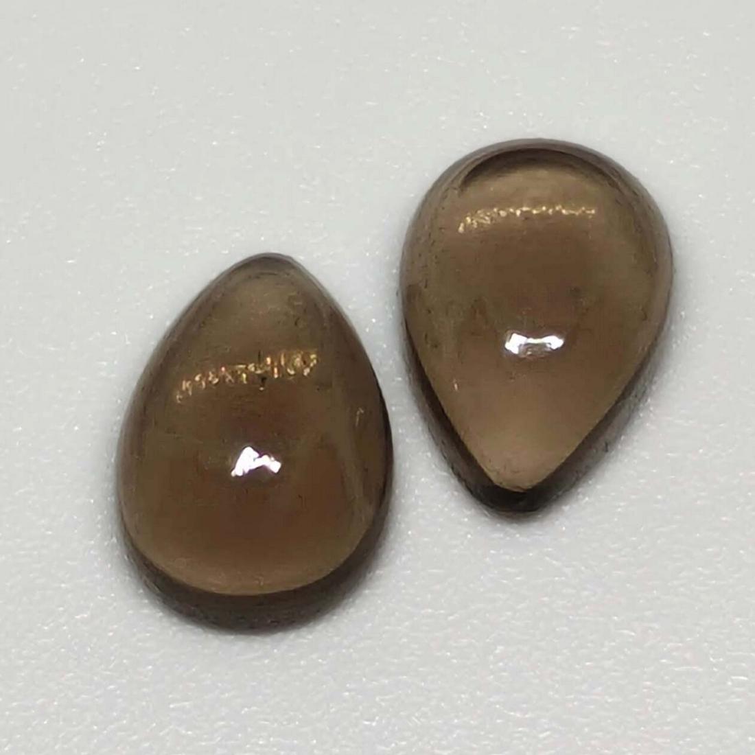 4.40 ct Natural Smoky Quartz Pair: No Reserve! Gemstones: Smoky Quartz Carat Weights: 4.40 ct Size/Dimensions: 10 x 7 x 4 mm Origin : Scotland Shipping: Domestic: Flat-rate of $7.00 to anywhere within the contiguous U.S. International: