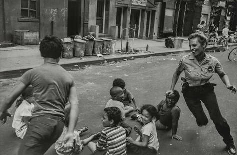 LEONARD FREED - Policewoman Playing with Children: Artist: Leonard FreedTitle: Policewoman Playing with Children, Harlem, 1978Medium: Photo Litho, 2008, ChinaDimensions: 8.5x5.55"Description: Heat Wax Mounted on 8.5x11" Conservation BoardArtist Bio: 