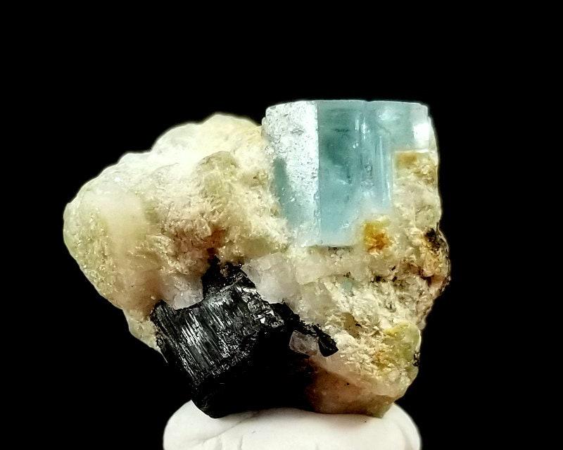 5 Gram Lovely Natural Blue Aquamrine With Tourmaline: 5 Gram Lovely Natural Blue Aquamrine With Tourmaline Specimen From Skardu pakistan size 13mm 11mm 17mm weight 5 Gram Reserve: $10.00 Shipping: Domestic: Flat-rate of $10.00 to anywhere within the cont