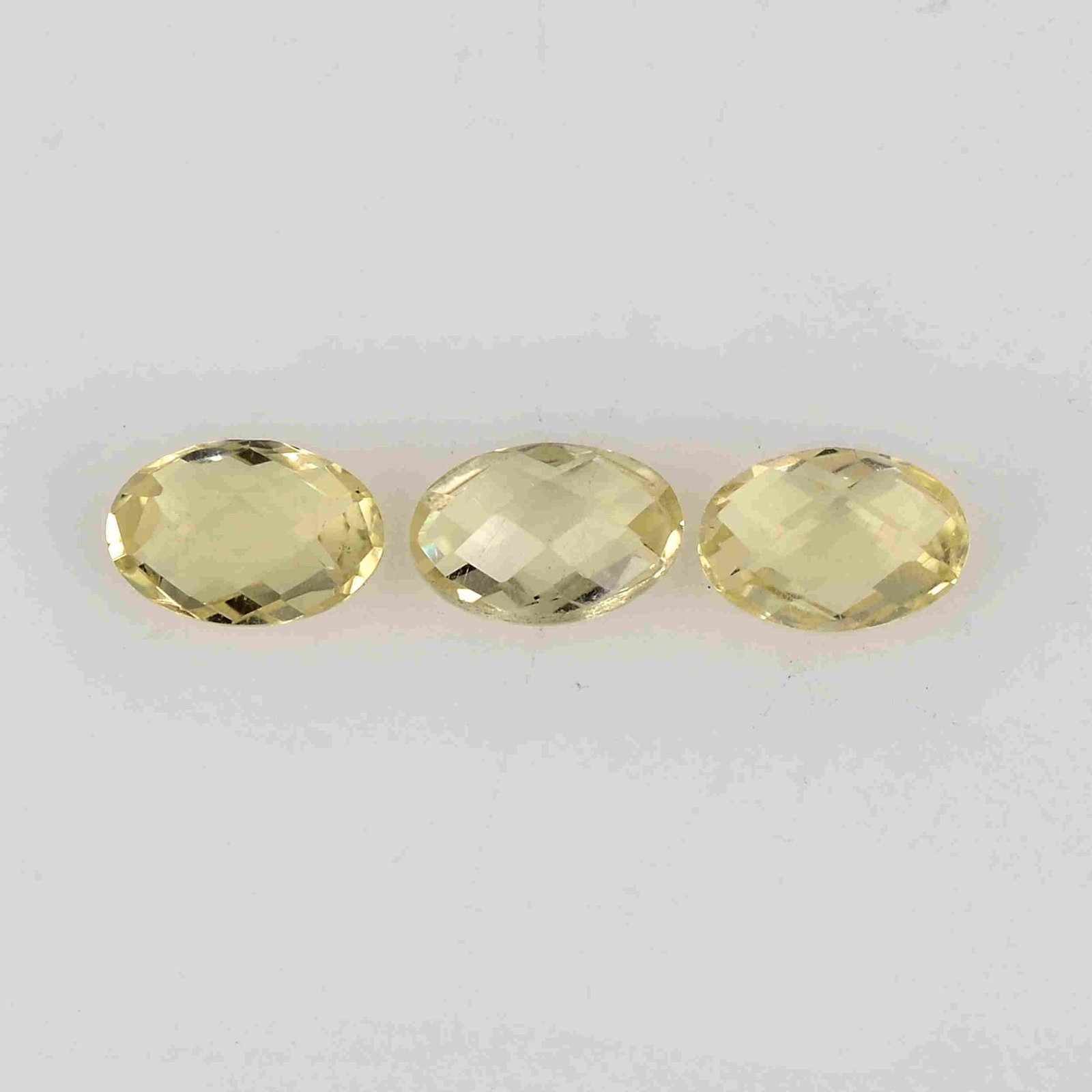 1.25 Carat Yellow Color Natural Oval Lemon Quartz Loose: No Reserve! Title: 1.25 Carat Yellow Color Natural Oval Lemon Quartz Loose Gemstone 3 Pieces Brand: Gems Trading Center Gemstones: Lemon Quartz Carat Weights: 1.25 Size/Dimensions: 2.5H x 6L x 4W mm S