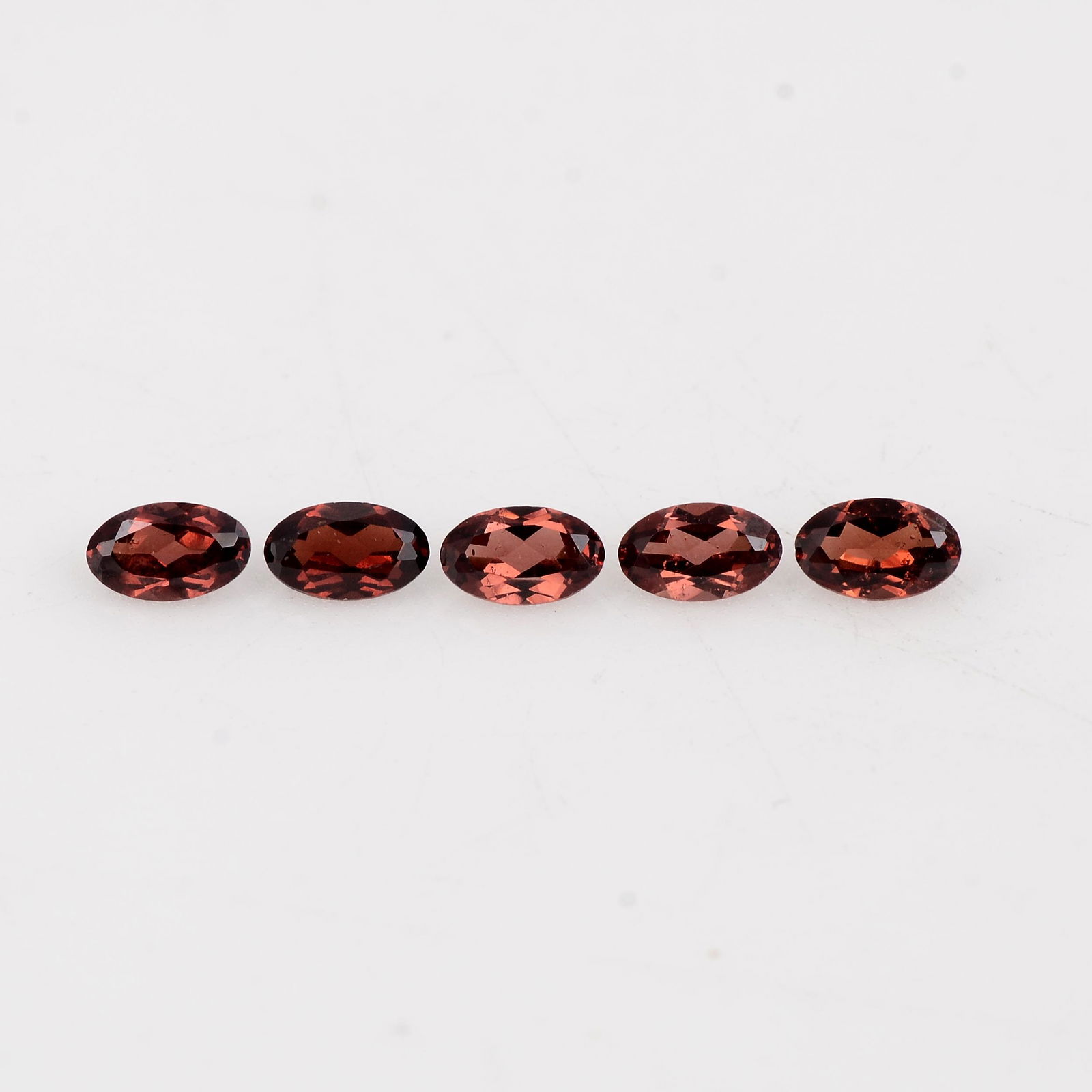 1.36 Carat Red Color Natural Oval Garnet Loose Gemstone: No Reserve! Title: 1.36 Carat Red Color Natural Oval Garnet Loose Gemstone 5 Pieces Additional Information: Specification of Gemstone Stone : Garnet Shape : Oval Size : 2H x 5L x 3W mm Color : Red Cut