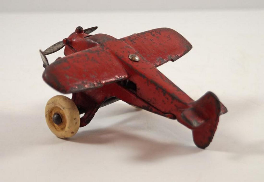 Antique Tri-Prop Airplane Cast Iron Vindex Toy: Title: Antique Tri-Prop Airplane Cast Iron Vindex Toy Date/Period: Circa 1930's-40's. Dimension: 4" wide x 3 7/8" long. Additional Information: Depicts an Airplane with tri engines cast iron Toy. Pain