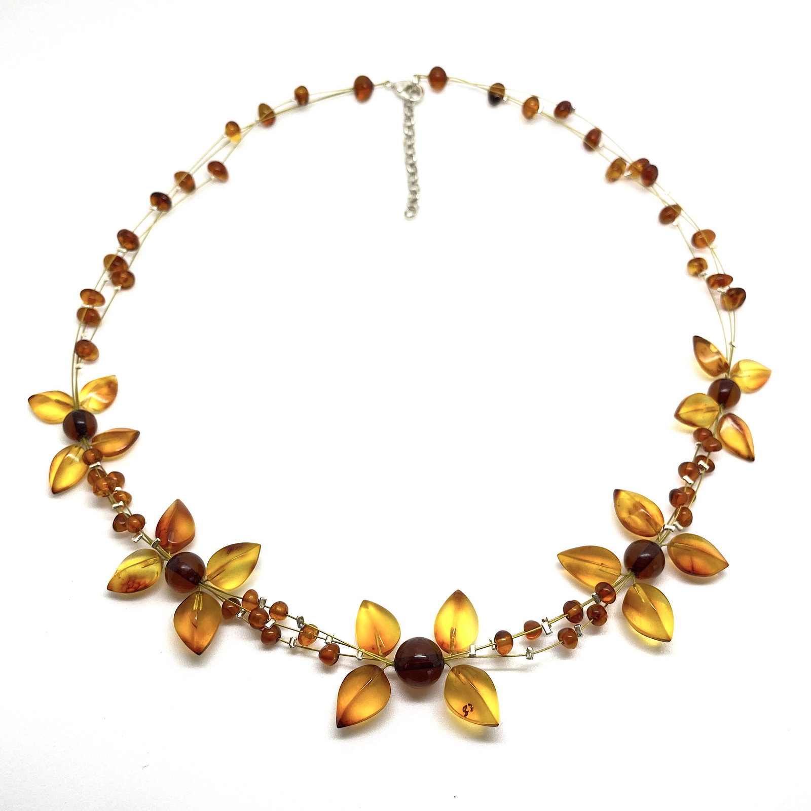 Unique and Exquisite Amber Floral Necklace made from: Title: Unique and Exquisite Amber Floral Necklace made from leaf like bead ornaments Metal: None Gemstones: Amber Weight: 10.2 g Size: Size: 31.0 x 8.0 x 420.0 mm Size: 1.22 x 0.315 x 16.535 inches Ma
