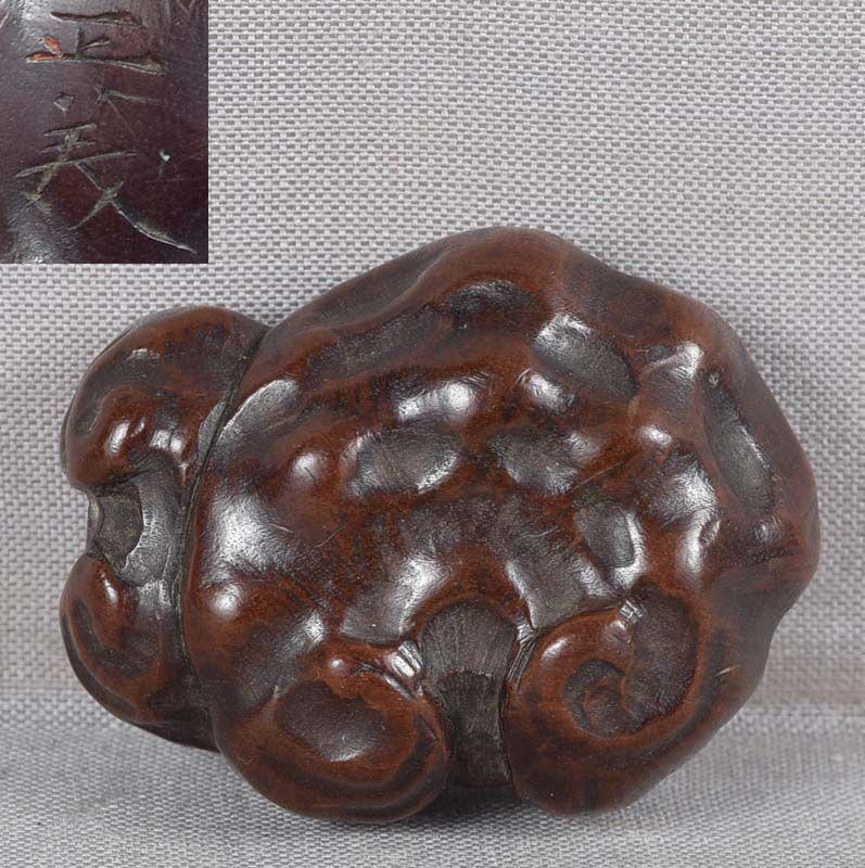 19c netsuke FUNGUS OF IMMORTALITY by MASAYOSHI: 19th century wooden netsuke of two heads of reishi fungus (Fungus of Immortality) issuing from the same stem. Superbly carved elegant piece in Japanese taste, beautiful rhythm to the ridges of the fun