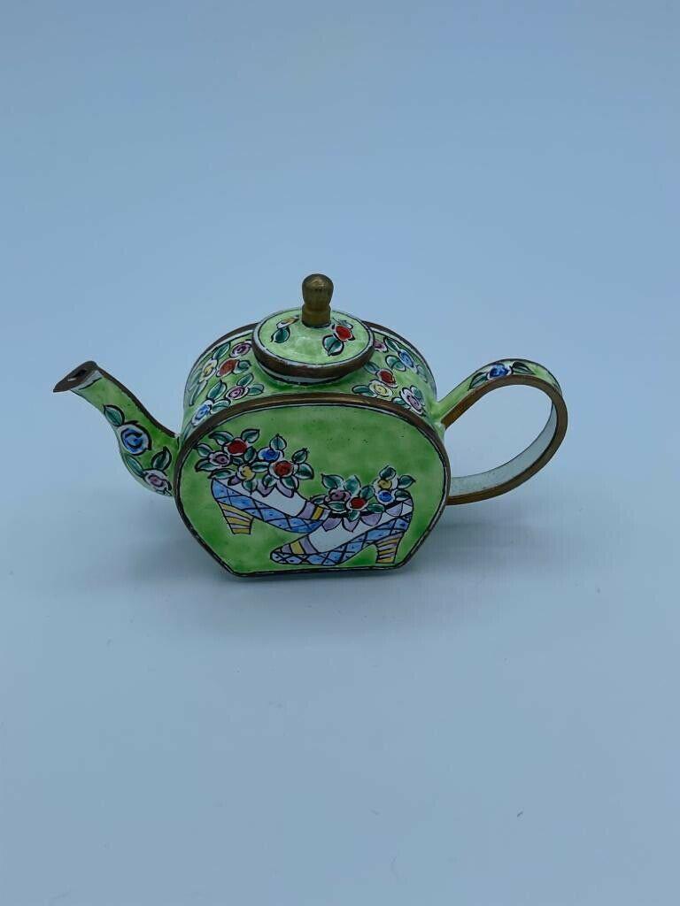 kelvin chen miniature enamel teapots no.57: kelvin chen miniature enamel teapots no.57. Reserve: $35.00 Shipping: Domestic: Flat-rate of $20.00 to anywhere within the contiguous U.S. International: Foreign shipping rates are determined by desti