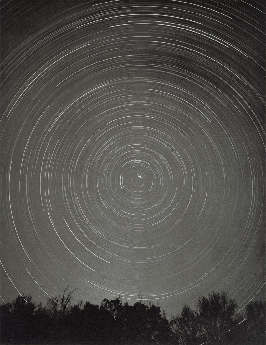 ANDREAS FEININGER - Tracks of the Wheeling Stars: Artist: Andreas Feininger Title: Tracks of the Wheeling Stars, Connecticut, 1965 Medium: Duotone Photo Litho, 1973, USA Dimensions: 7.35x9.5" Description: Heat Wax Mounted on 8.5x11" Conservation Boar