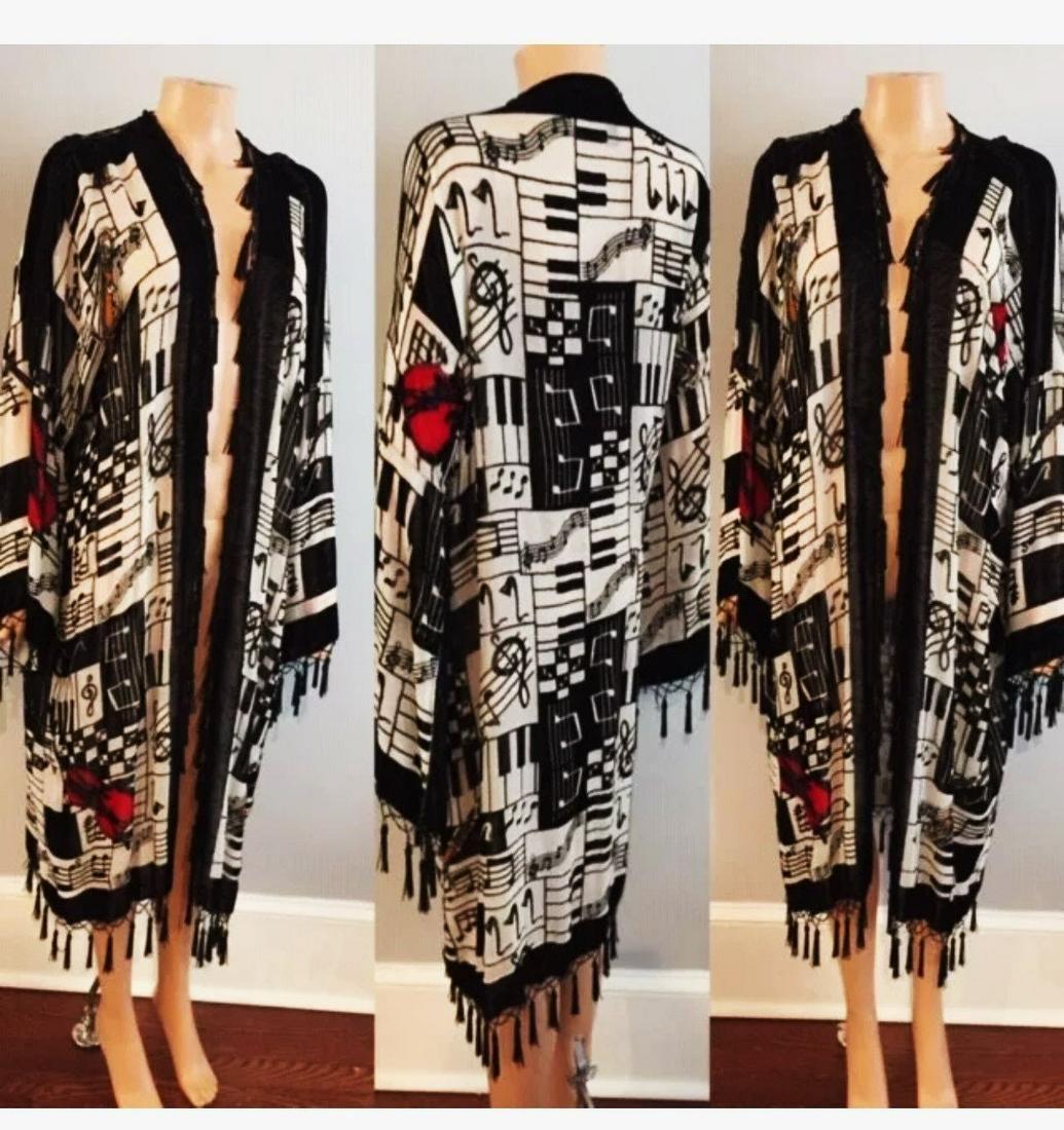 Vtg Opera Coat Velour Avant Garde Fringes Tassels Free: Velour Free Size Opera Coat Music Printed Theme. Avant garde Fringes and Tassels. In very good vintage condition. Amazingly Stunning Waerable Art Free Size Reserve: $195.00 Shipping: Domestic: Flat-ra
