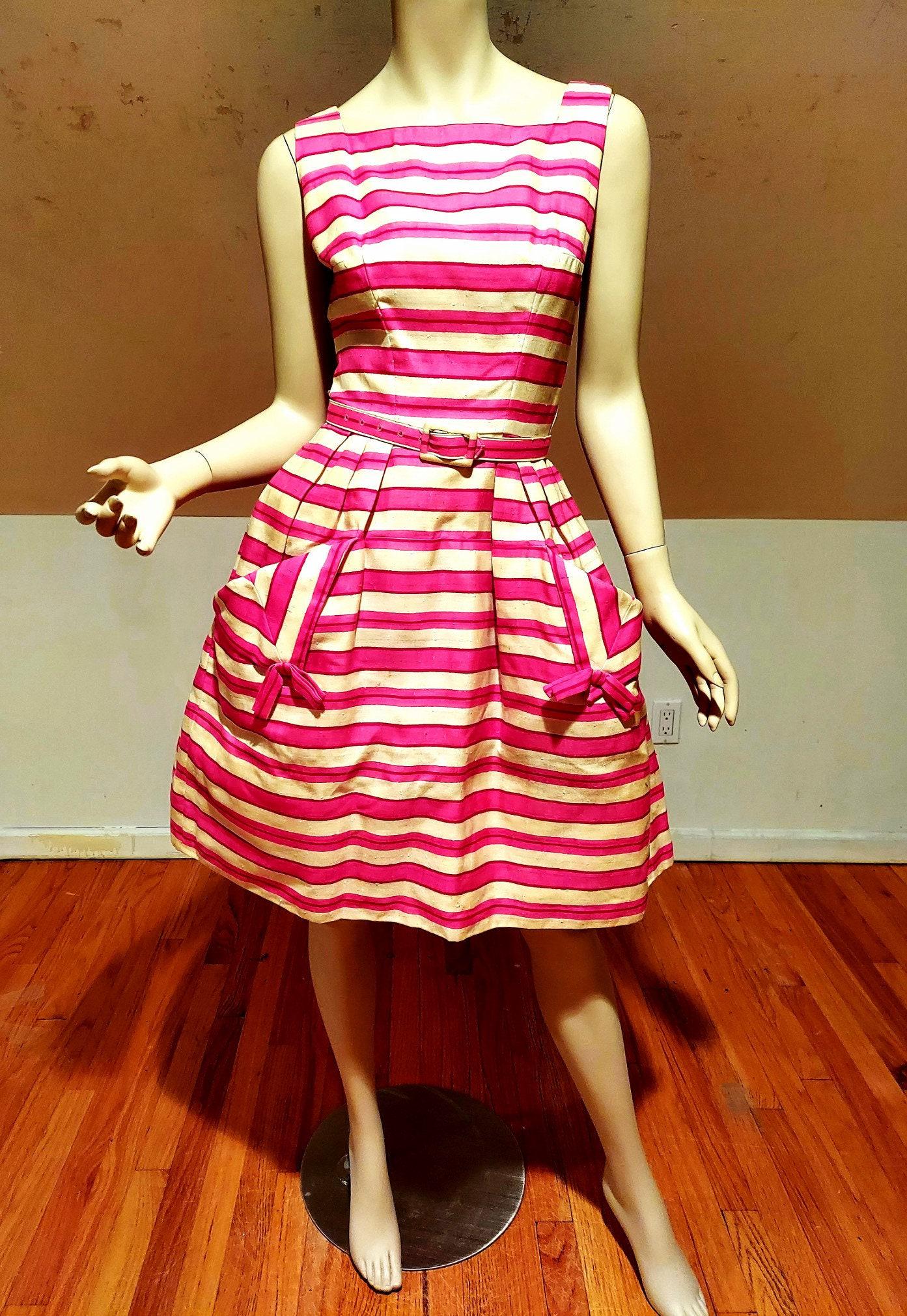 Vtg 1950's Suzy Perette Striped Linen Dress Cinched: Very Beautiful striped Linen dress by famous Suzy Perette . Dine Linen open flap pockets with bows and buckle Belt ade of the same fabric. Also has its own tulle crinoline. A size -M In very good vint