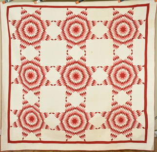 MUSEUM QUALITY 1880's Stars Quilt: 1870's/1880's cotton red, cinnamon pink, and white pieced stars quilt, all hand pieced and hand quilted, with small diamond pieces measuring 1" per side. The condition is near mint, unwashed, with a c