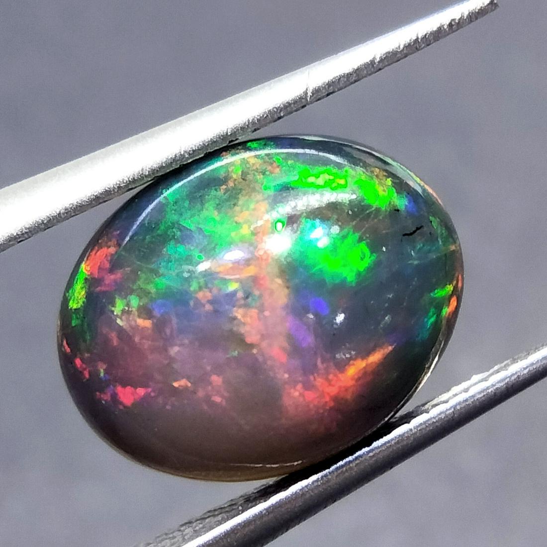 Opal,2.84 Cts Natural Black Color & Oval Cut (1 of 8)
