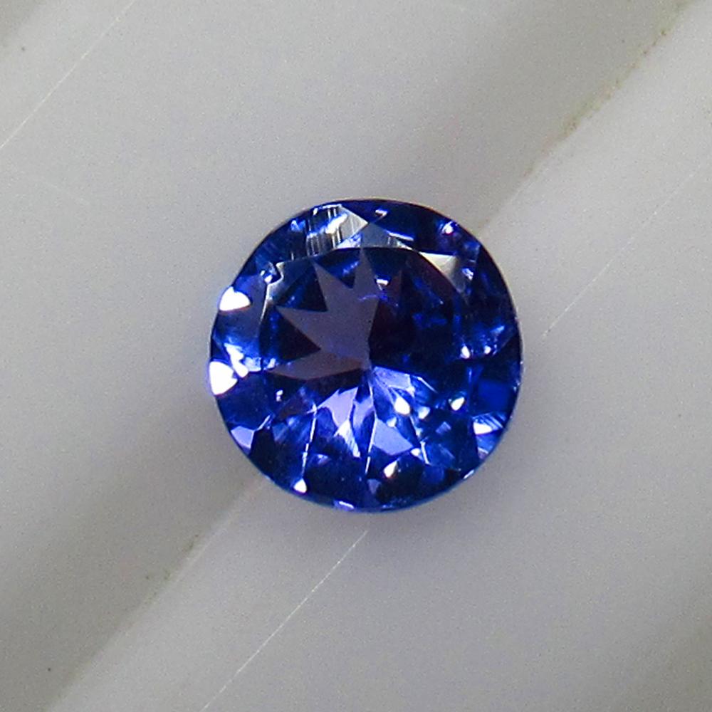0.36 Ctw Natural Tanzanite Round Cut: Title: 0.36 Ctw Natural Tanzanite Round Cut Stone Clarity: VVS Gemstone: Tanzanite Carat Weights: 0.36 Size/ Dimensions: 4.80 x 4.80 x 2.40 mm Additional Info: Top Quality Luster / Excellent Round Cut