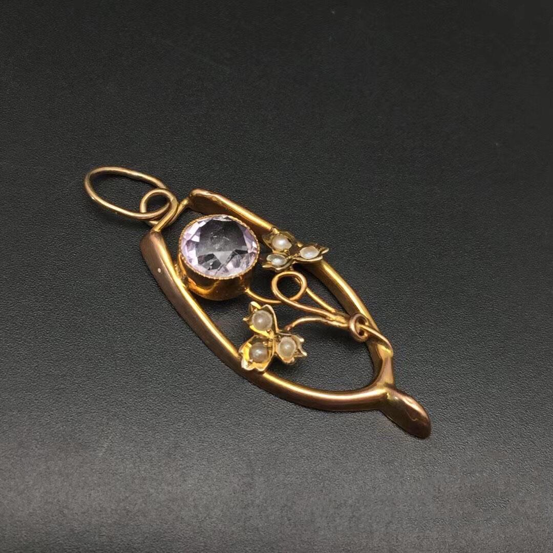 The antique 9 k gold pendant: Title: The antique 9 k gold pendant Materials: 9K Gold Description: British antique 9 karat gold pendantWeight: 1.9 g"Stamp: 9CT Inlaid amethyst, pearl, good appearance, exquisite workmanship, good to