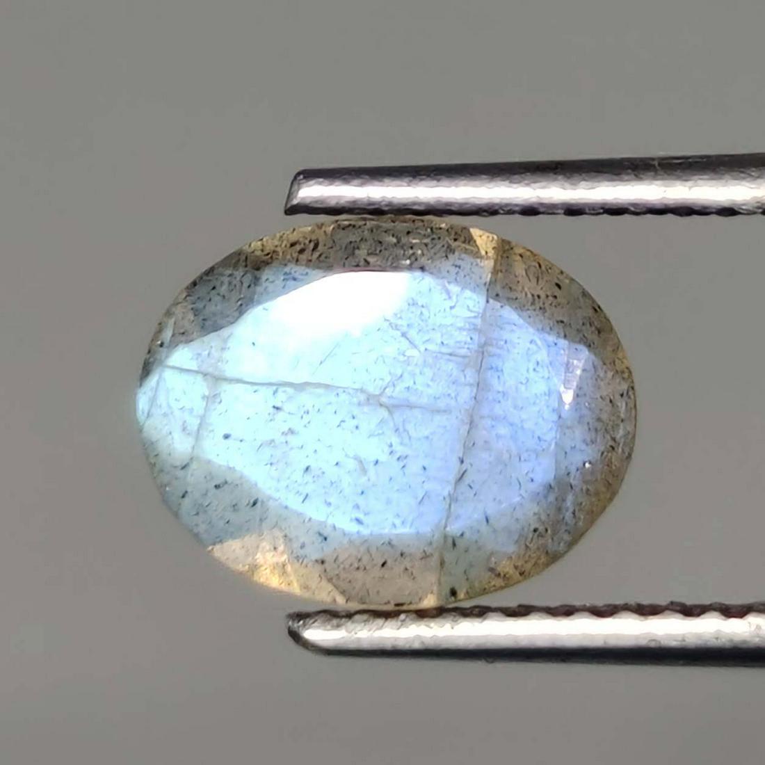 1.50 ct Natural Faceted Labradorite: No Reserve! Title: 1.50 ct Natural Faceted Labradorite Description: Gemstones: Labradorite Carat Weights: 1.50 ct Size/Dimensions: 9 X 7 mm Origin : Labrador Materials & Techniques: Labradorite Weight