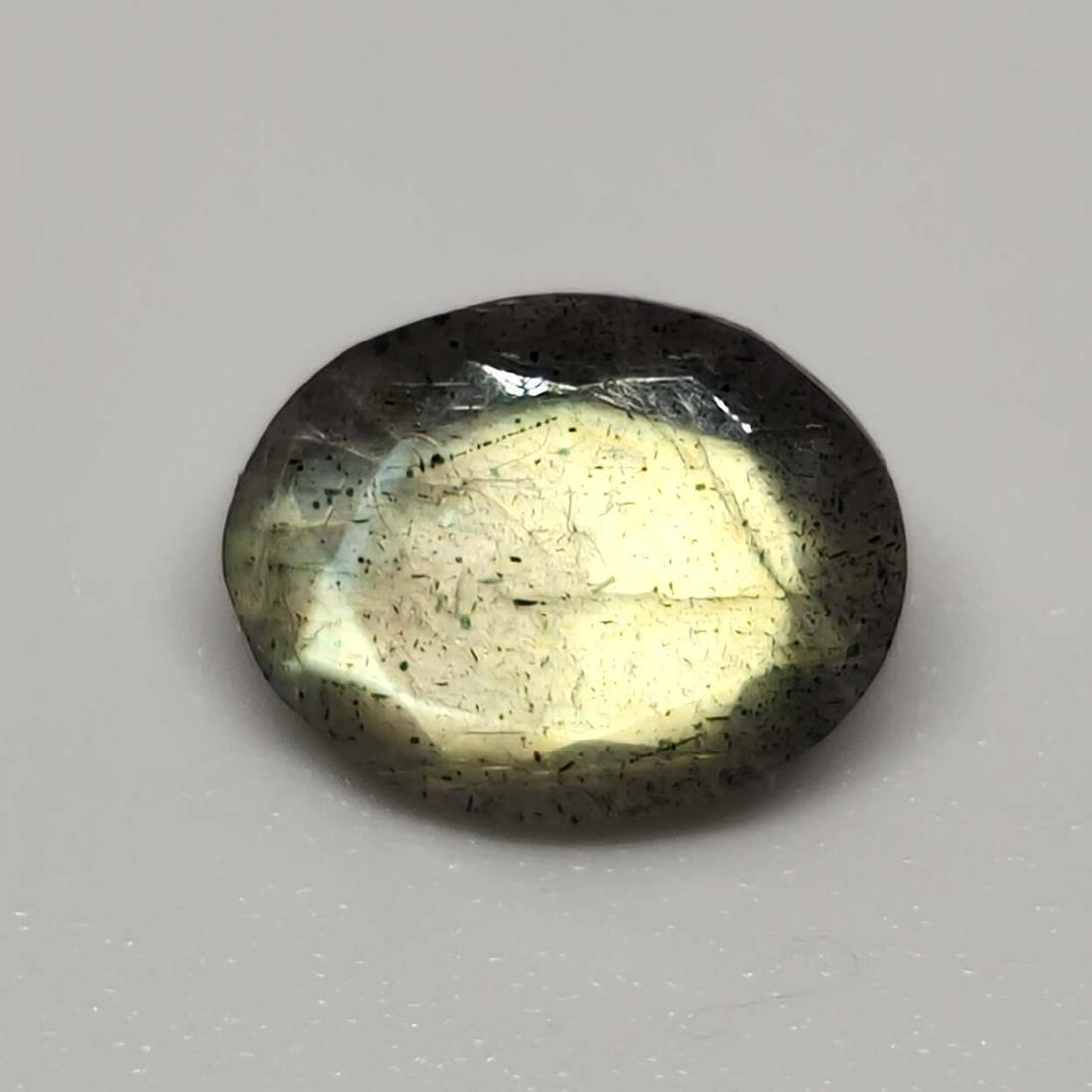 1.60 ct Natural Faceted Labradorite: No Reserve! Title: 1.60 ct Natural Faceted Labradorite Description: Gemstones: Labradorite Carat Weights: 1.60 ct Size/Dimensions: 9 X 7 mm Origin : Labrador Materials & Techniques: Labradorite Weight