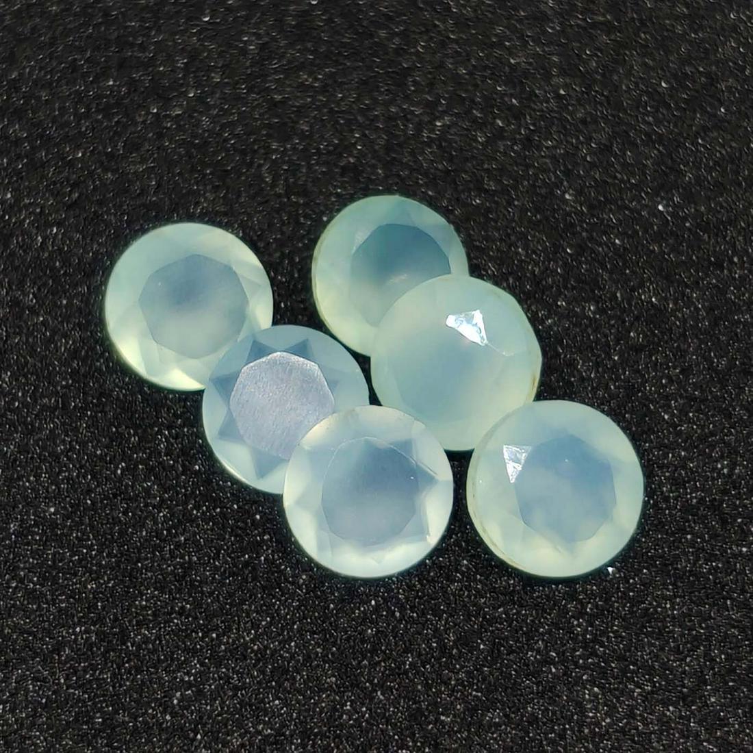 4.35 ct Natural Aqua Chalcedony Faceted Lot: No Reserve! Title: 4.35 ct Natural Aqua Chalcedony Faceted Lot Description: Gemstones: Chalcedony Carat Weights: 4.355 ct Size/Dimensions: 6 X 6 mm Materials & Techniques: Chalcedony Weight Unit: Ct Q